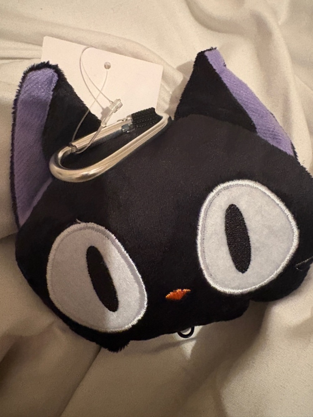 Black Plush coin purse in image of choco cat -holds reusable shopping bag